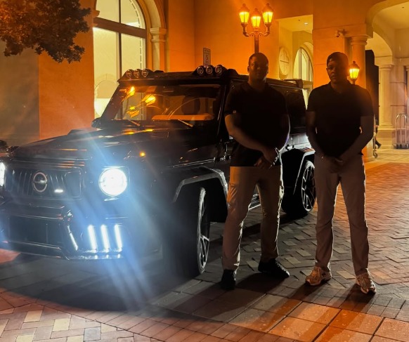 BKS executive protection detail with blacked-out SUV